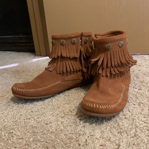 Minnetonka moccasin booties 8.5. Fits more like an 8.   I never wore them .